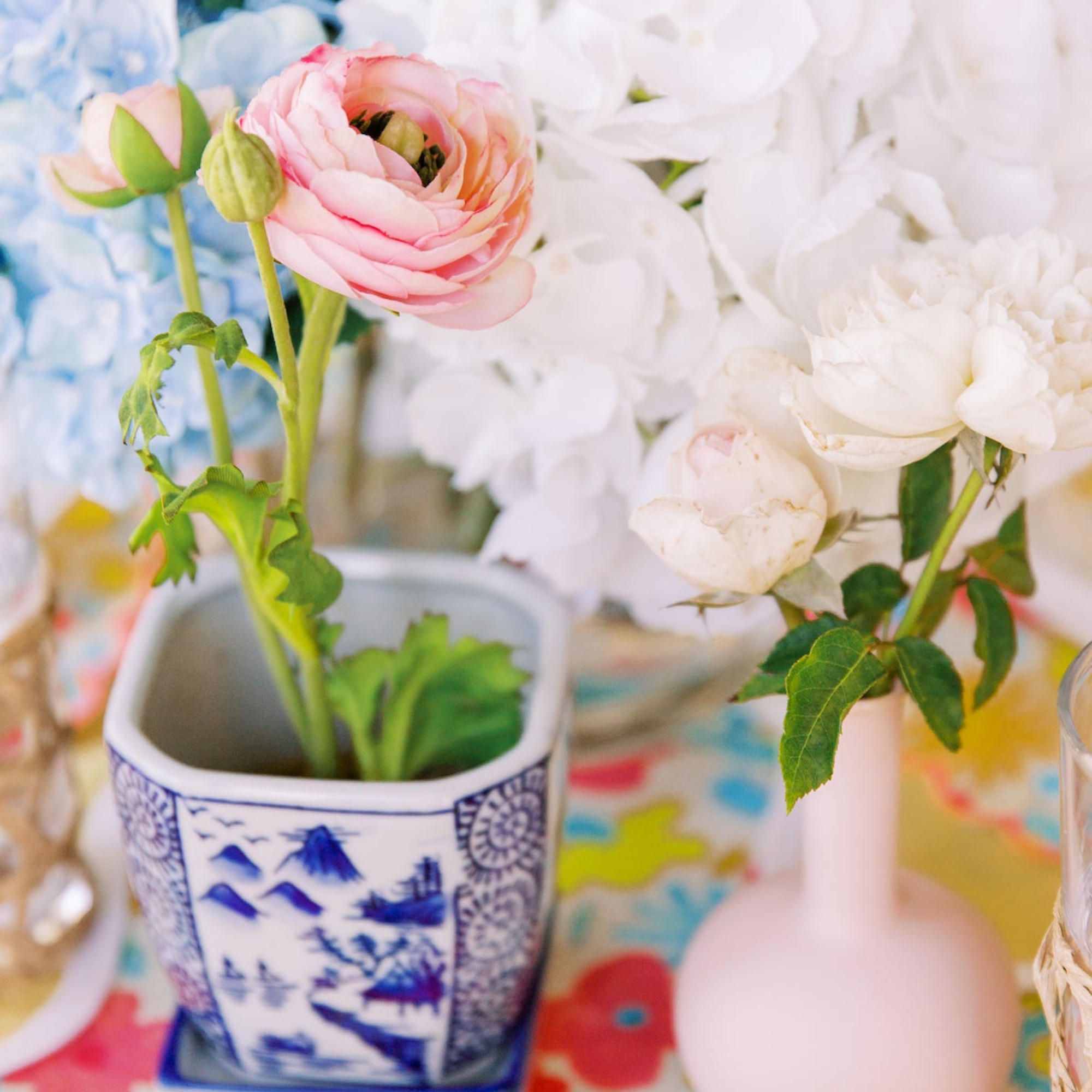 Pink Ranunculus in Terracotta Vase